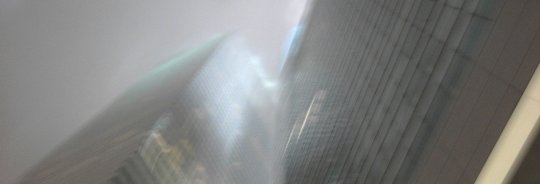 Photograph of
		      skyscrapers in fog